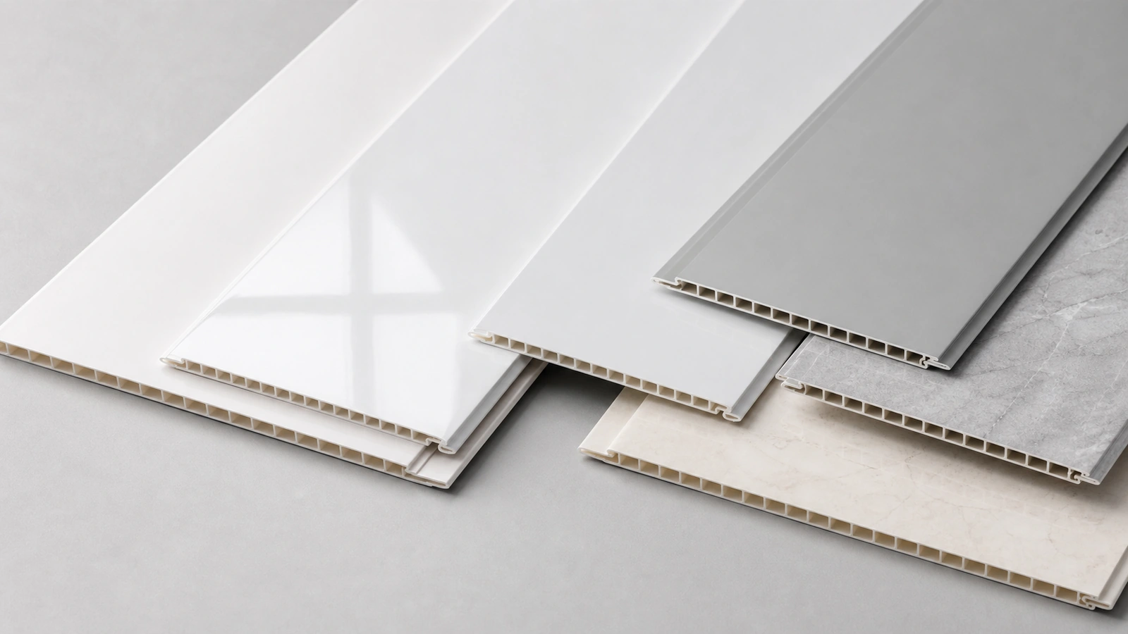 PVC ceiling panel types including flat smooth white grey and marble look finishes